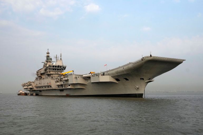 India's first Indigenous Aircraft Carrier INS Vikrant is seen in Mumbai, India, Friday, March 10, 2023. INS Vikrant, which is India's first home-built aircraft carrier in its quest to match an aggressive China with a much larger naval fleet, was commissioned in Kochi, on Sept. 2, 2022. (AP Photo/Rajanish Kakade)