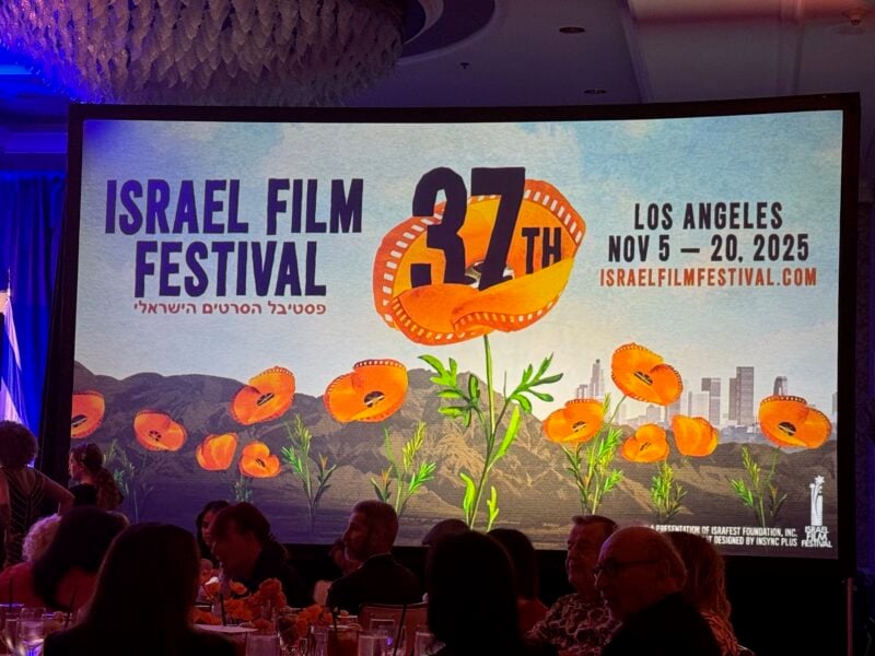 Israel Film Festival (IFF)-June 6, 2025 Prelude Luncheon 6 At the luncheon the big screen-Courtesy Nurit Greenger