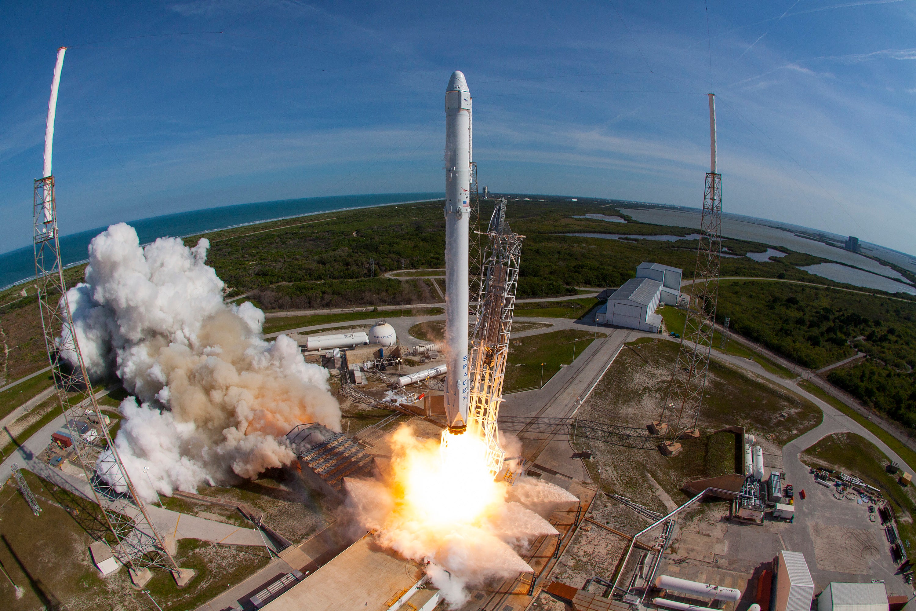 SpaceXs Falcon 9 rocket and Dragon spacecraft lift off from Launch Complex 40 at the Cape Canaveral Air Force Station in Florida